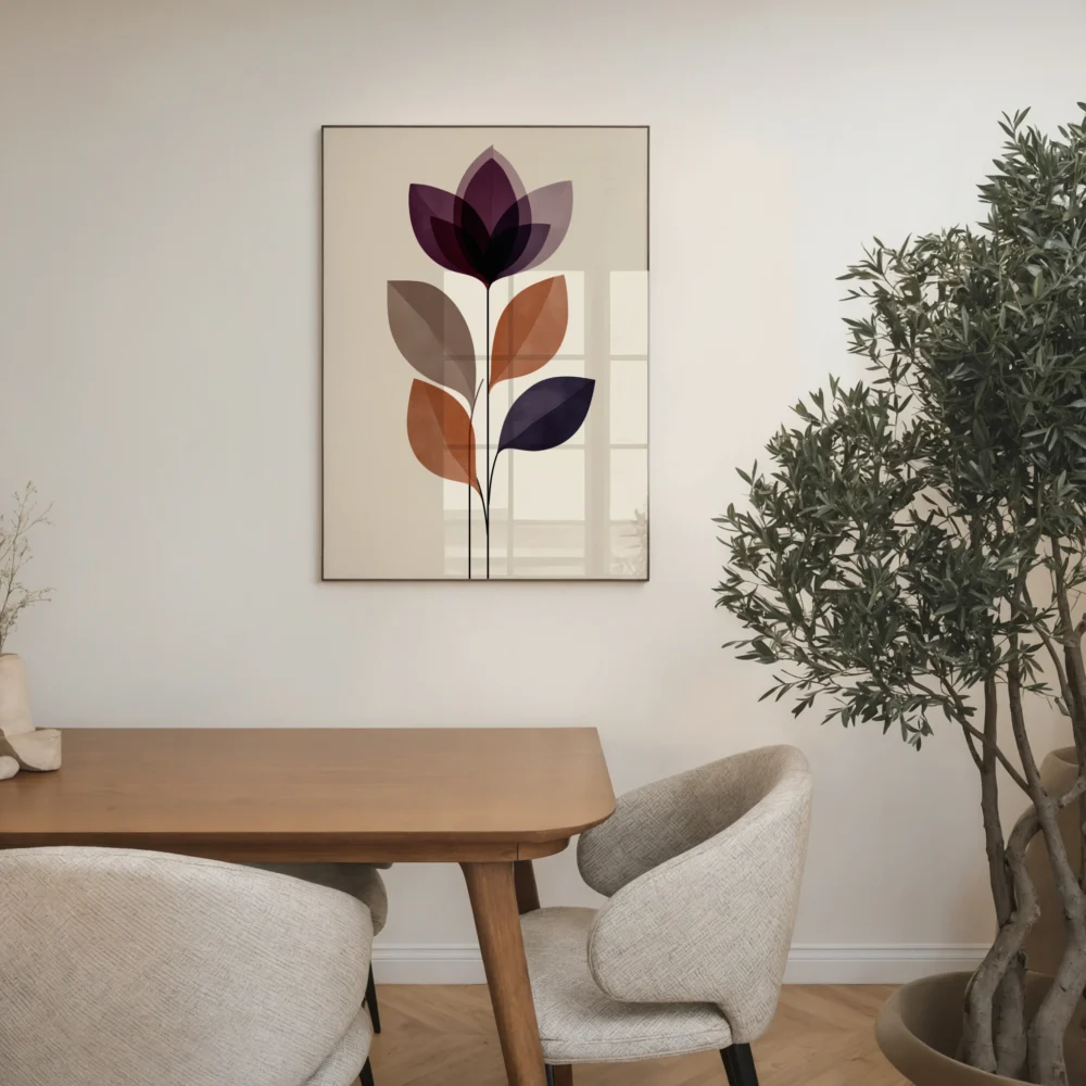 Framed abstract flower art print with layered purple and brown shapes, displayed on a neutral wall in a contemporary dining room with a wooden table, chairs, and a large potted olive tree.