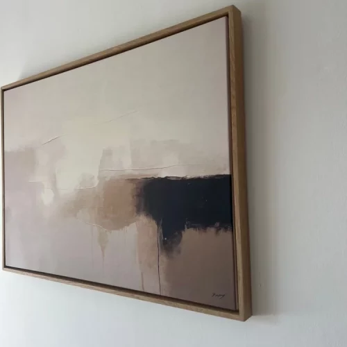 Abstract minimalist painting with beige tones and dark horizontal stripe in wood frame.